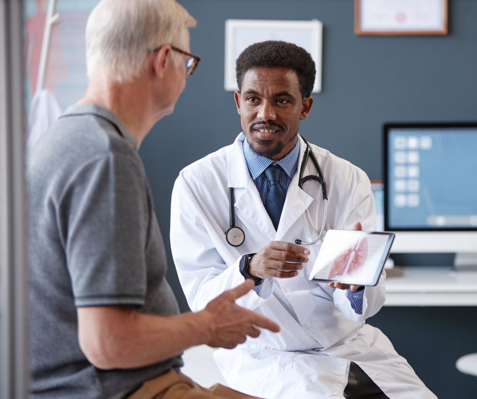 Doctor speaking on camera in a clean medical office while recording a patient education video for a busy medical practice